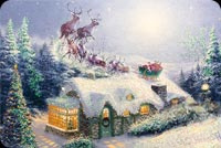Animated: Santa and Reindeer Over Snowy Cottage email background