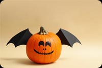 Pumpkins With Smile And Wings Background