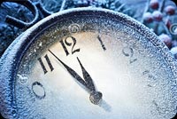 New Year Clock Powdered With Snow Background