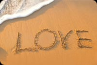 Animated: Love Written in Beach Sand email background